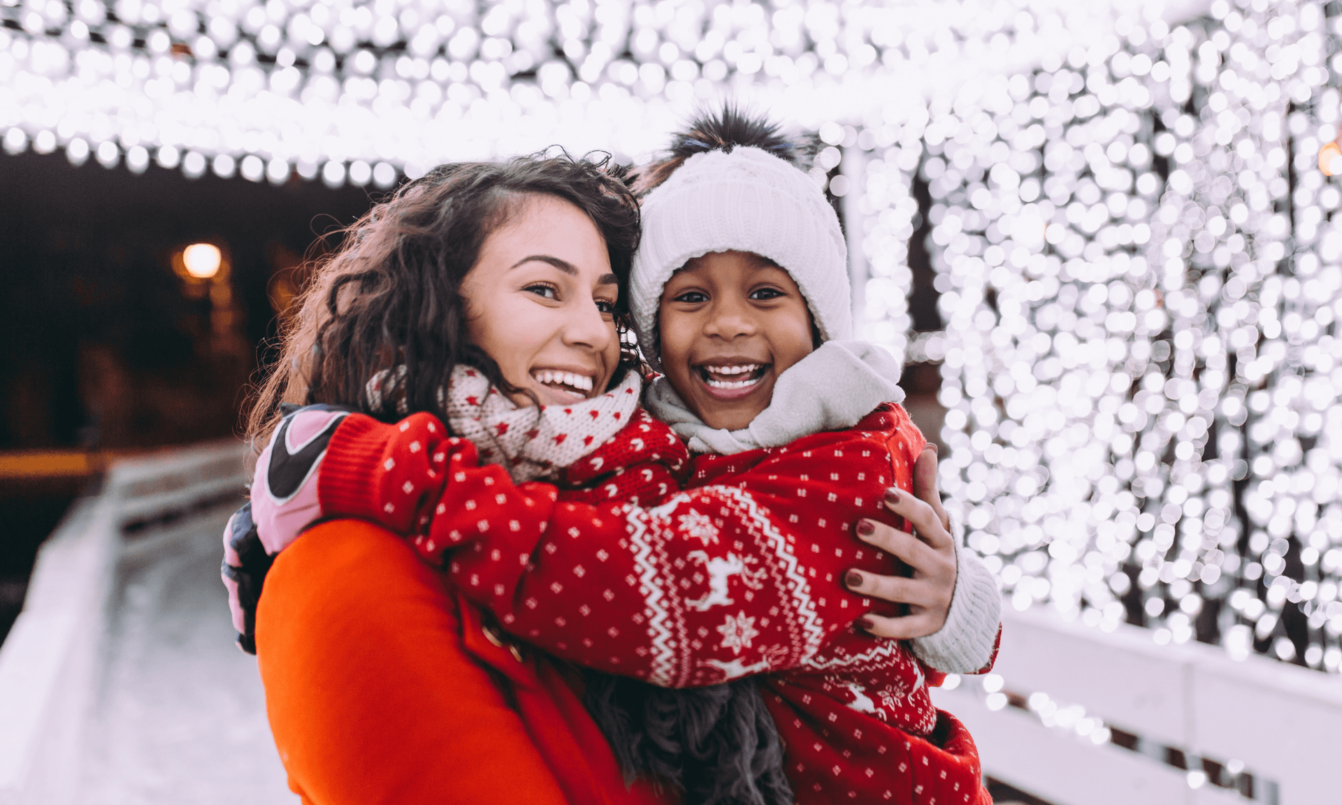 Mom and son enjoying holiday lights.